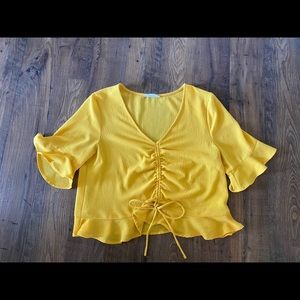 Yellow peplum cropped top